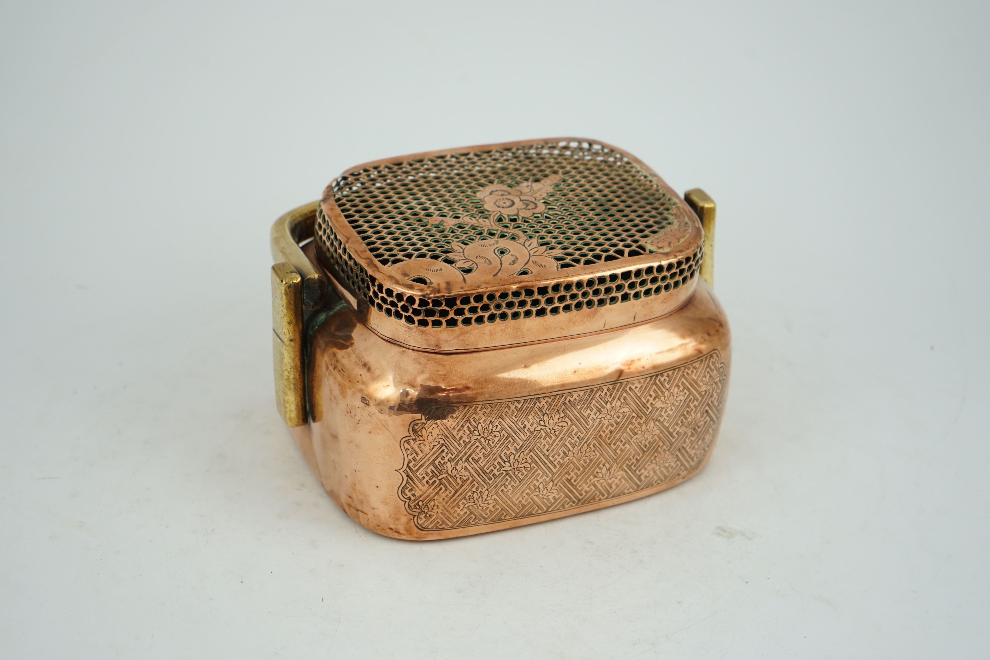 A Chinese copper alloy hand warmer, 18th century